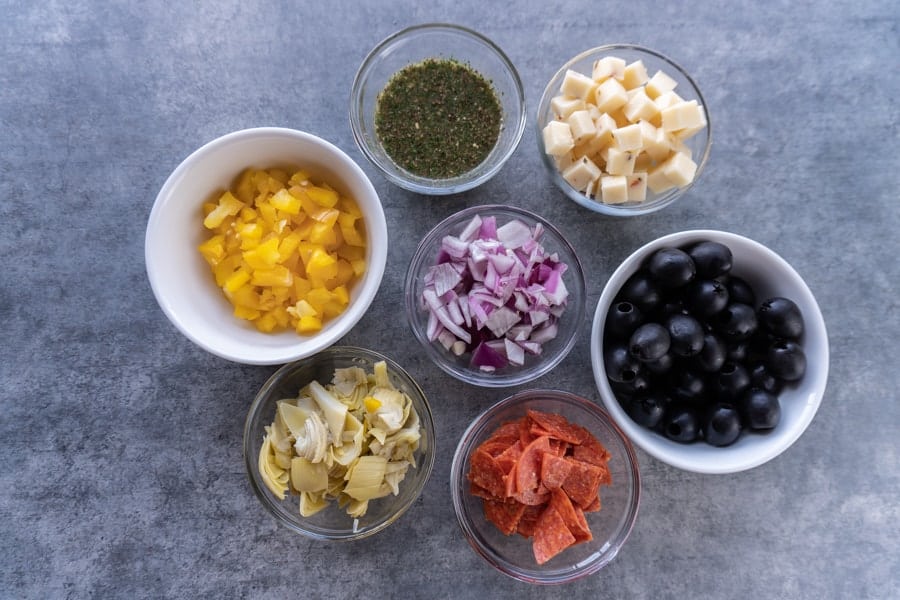 This easy pasta salad with pepperoni is quick and delicious! It’s great for dinner with the family or a party! #pastasalad #partyrecipe #bbq #atablefullofjoy #italianpastasalad #antipasta #sidedish #summer