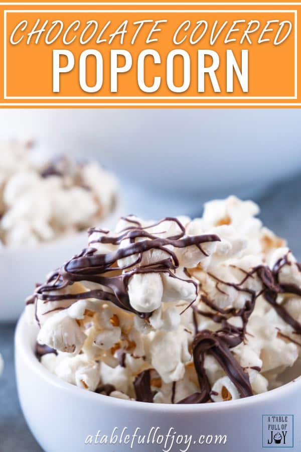 This chocolate drizzled popcorn is easy to make and super addicting! Three ingredients is all it takes to make this yummy treat! #popcorn #chocolate #whitechocolate #atablefullofjoy #party #forkids #easytomake