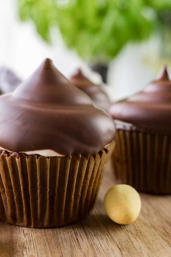 Marshmallow Frosting is a delicious and fun frosting for any cupcake- especially if you dip it in chocolate! #marshamllow #marshmallowfrosting #frosting #easy #atablefullofjoy #highhatcupcake #hihatcupcake #hardshell #easter #easterdessert