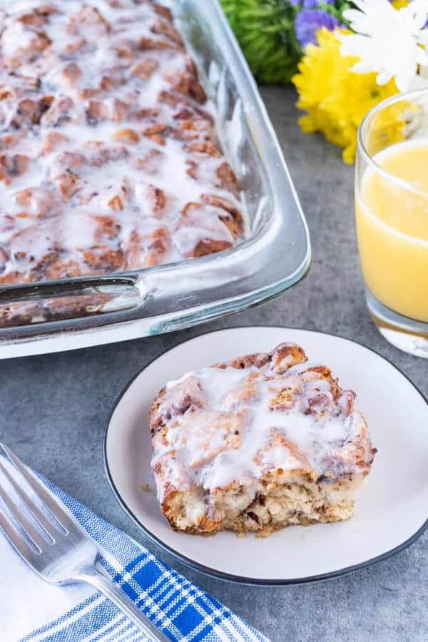 Cinnamon Roll French Toast smells amazing when baking and tastes even better! #cinnamonroll #frenchtoast #atablefullofjoy #breakfast #forkids #easytomake #cinnamon