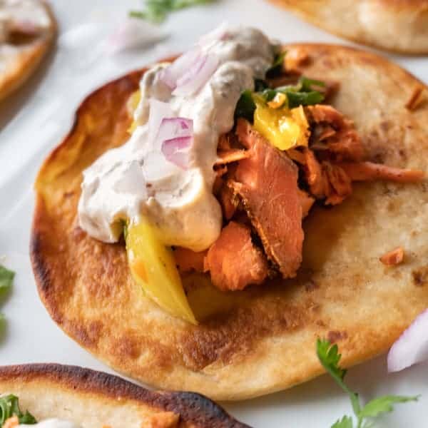 Salmon Tacos with a Chunky Mango Salsa, an easy and delicious salmon taco with a perfect salsa to match! #atablefullofjoy #salmon #mango#salsa #fish #taco #tacotuesday #cincodemayo #summer #dinner #grill