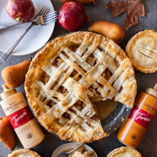 Caramel Pear Pie, An amazingly delicious pear pie with caramel and a beautiful flaky crust. #atablefullofjoy #pearpie #caramel #caramelpie #pie #toranisauceobsession #ad #sofab