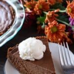 This chocolate pumpkin pie is an easy spin on the classic pumpkin pie. Rich and chocolaty- you can’t go wrong! #atablefullofjoy #chocolate #chocolatepie #chocolatepumpkinpie #pie #pumpkinpie #thanksgiving