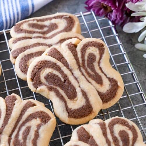 Butterfly Cookies -These tasty peanut butter and chocolate sugar cookies are fun to make and great for Spring! These butterfly cookies are a delicious spin on a classic sugar cookie recipe! #peantunbuttercookie #atablefullofjoy #sugarcookie #butterflycookie #forkids #babyshower #easy #simple #tutorial