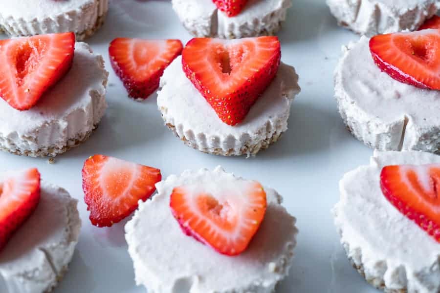 Mini Dairy Free Cheesecakes with strawberries on top