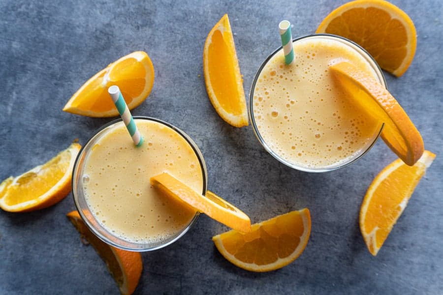 Orange Smoothie top down view of 2 glasses