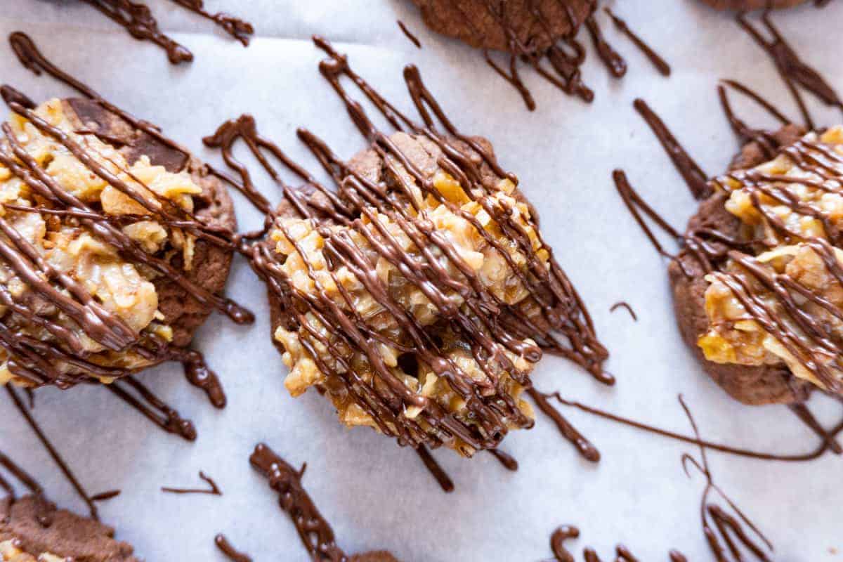 German Chocolate Cookies with chocolate drizzled on them