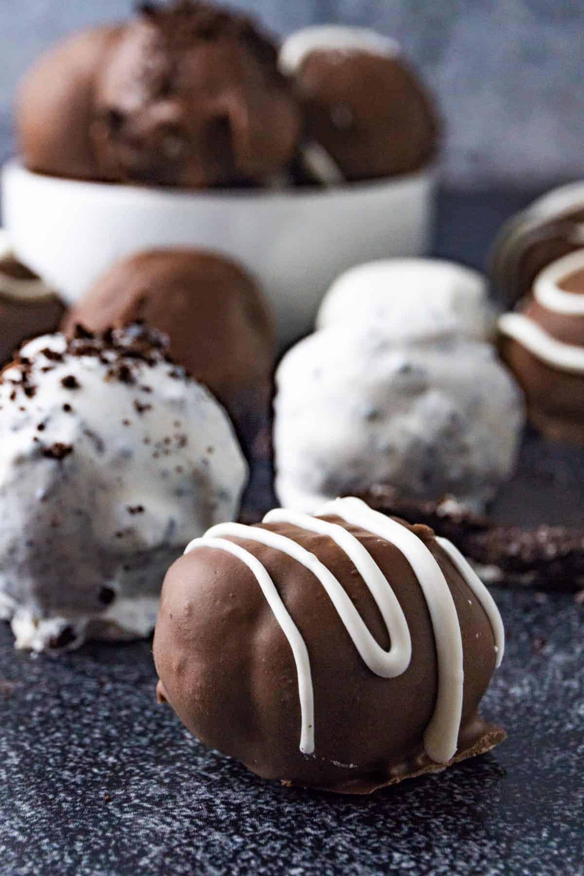 Side view of oreo balls with oreo balls in the background